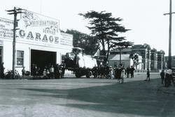 Menzies' aircraft 'Southern Cross Junior' arriving at the Hokitika dept of Newmans Motors, in sections on top of Newmans lorry, Sunday, 11 January, 1931.