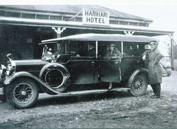 Newmans Motors service car and driver, Harihari, 1929