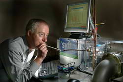 Syft CEO Geoff Peck trialling one of the prototypes of the SIFT-MS technology