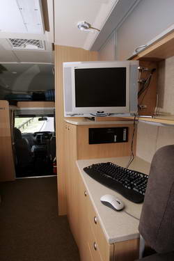 Careful use of space - Plasma screen in cupboard