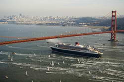 Queen Mary 2 sailing under San Francisco's Golden Gate Bridge before she makes her first crossing of the Pacific to Australia and New Zealand  
