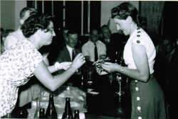 Audrey receiving a presentation