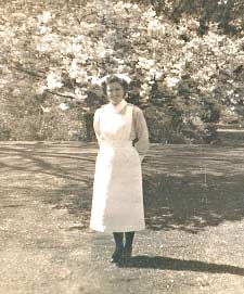 Betty in the grey uniform