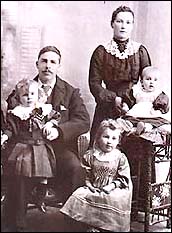 Enoch and Jane Barrett with children Charles, Nell and Joseph.