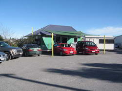 Brilliant blue sky at the rental car service, our car was the mini van on the right.