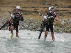 Winners Kashi Leuchs and Marcus Roy crossing the Hewson River