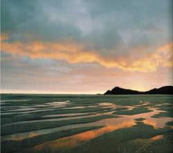 Sunlight over Awaroa Inlet