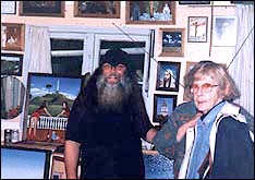 Mike discusses his work with interested visitors to his studio