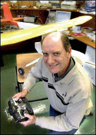 Geoff Graham take the controls of the prototype glider being developed in
	the Physics Department