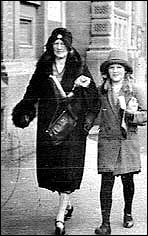 Mother and daughter dressed for a trip to town